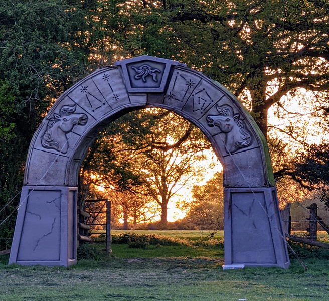 File:Sunset through the gate.png
